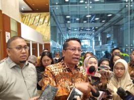MENYAMPAIKAN: Menteri Hukum Supratman Andi Agtas memberikan keterangan pada pers di Kawasan Parlemen, Jakarta, Jumat (26/9/2025). (Dok. Istimewa)